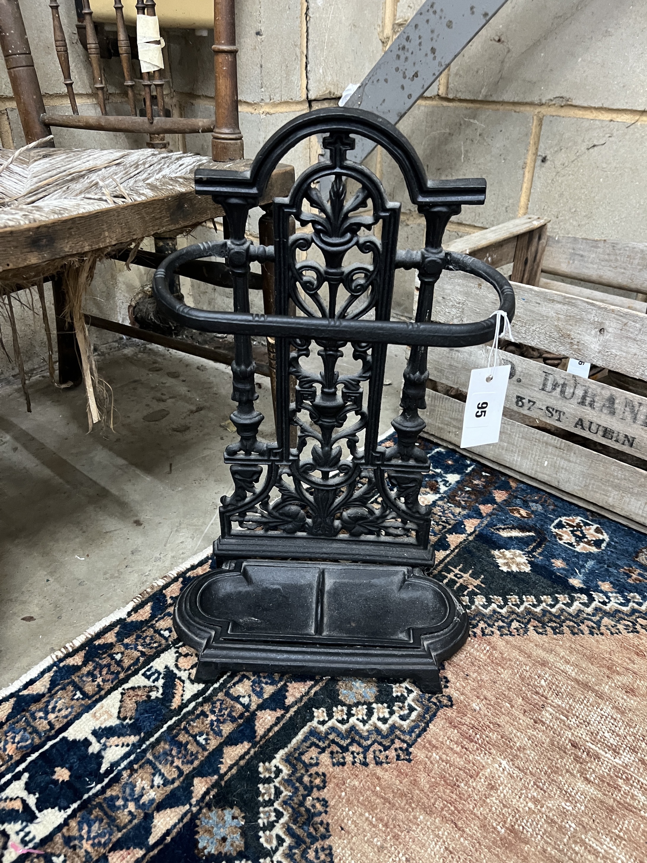 A small Victorian style cast iron stickstand, height 52cm